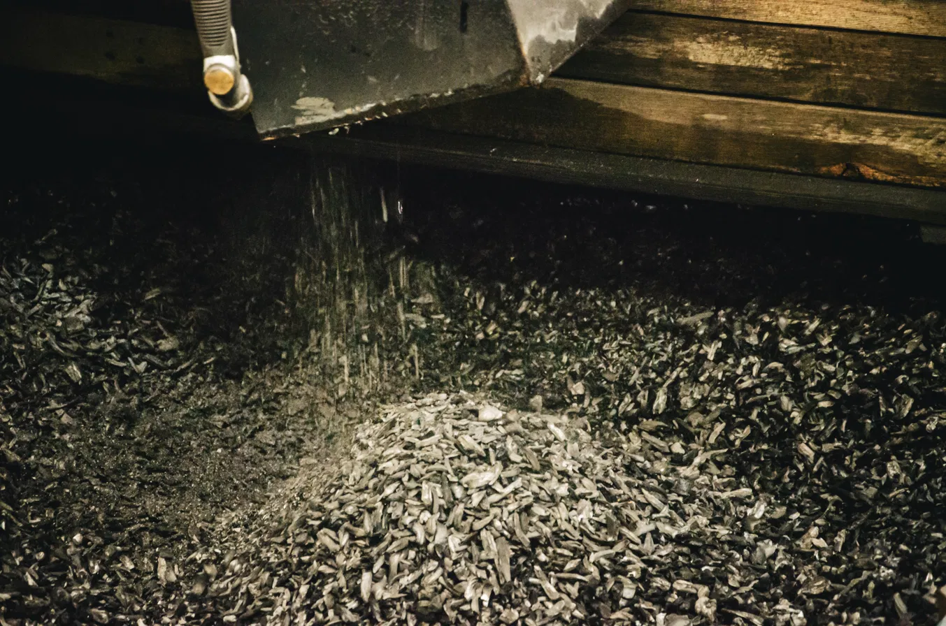 Biochar being produced from reclaimed timber