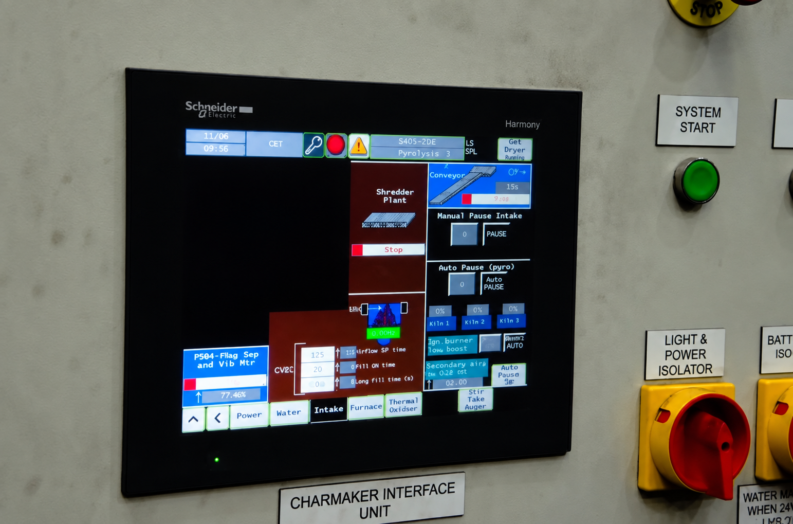 Close-up of the biochar machine touchscreen interface and system start control
